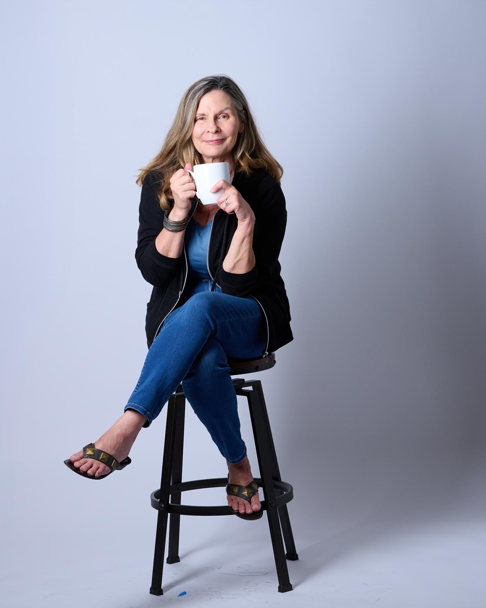 Cindy enjoying coffee - frame 9