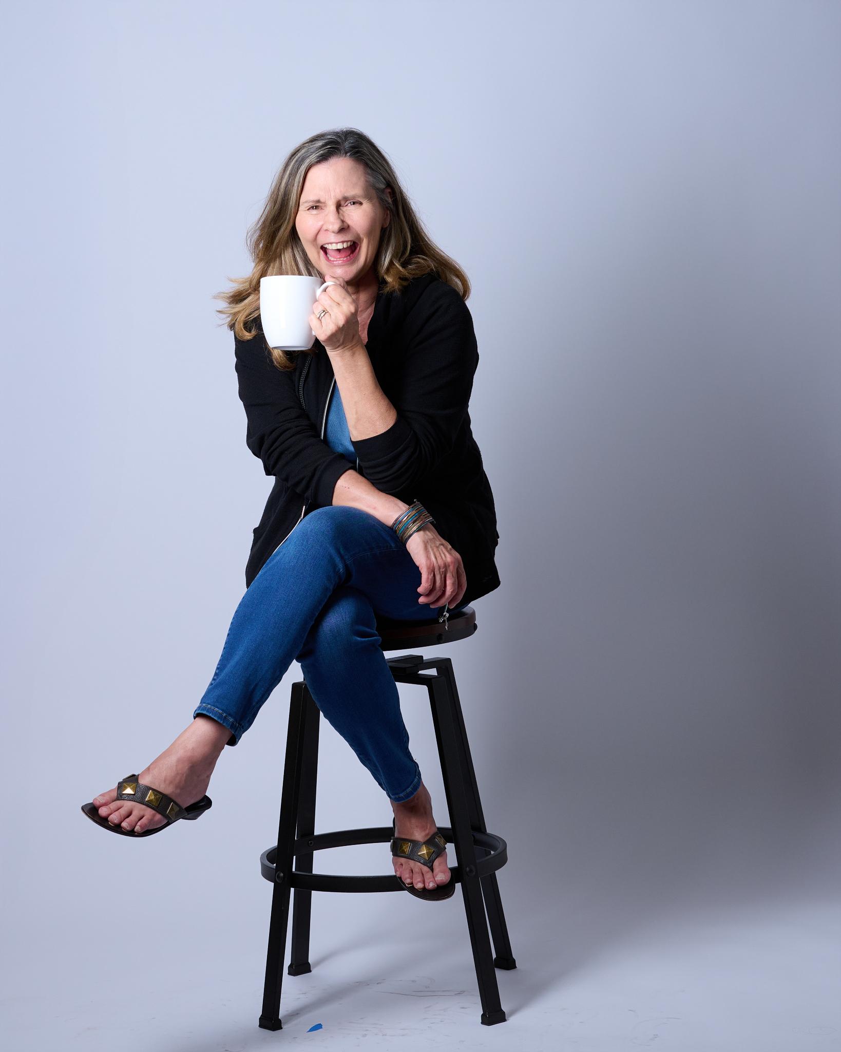 Cindy enjoying coffee - frame 12