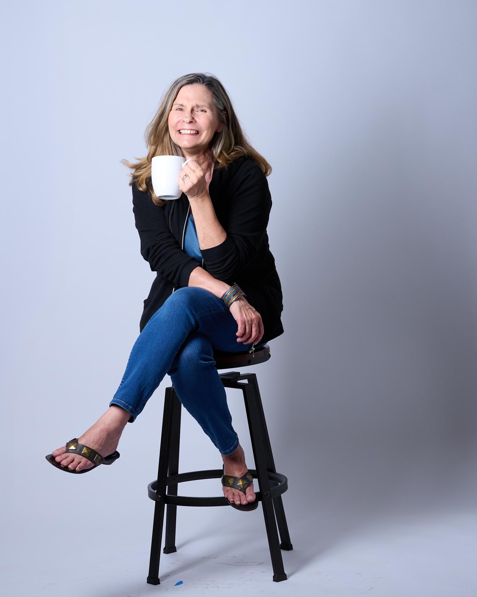 Cindy enjoying coffee - frame 14