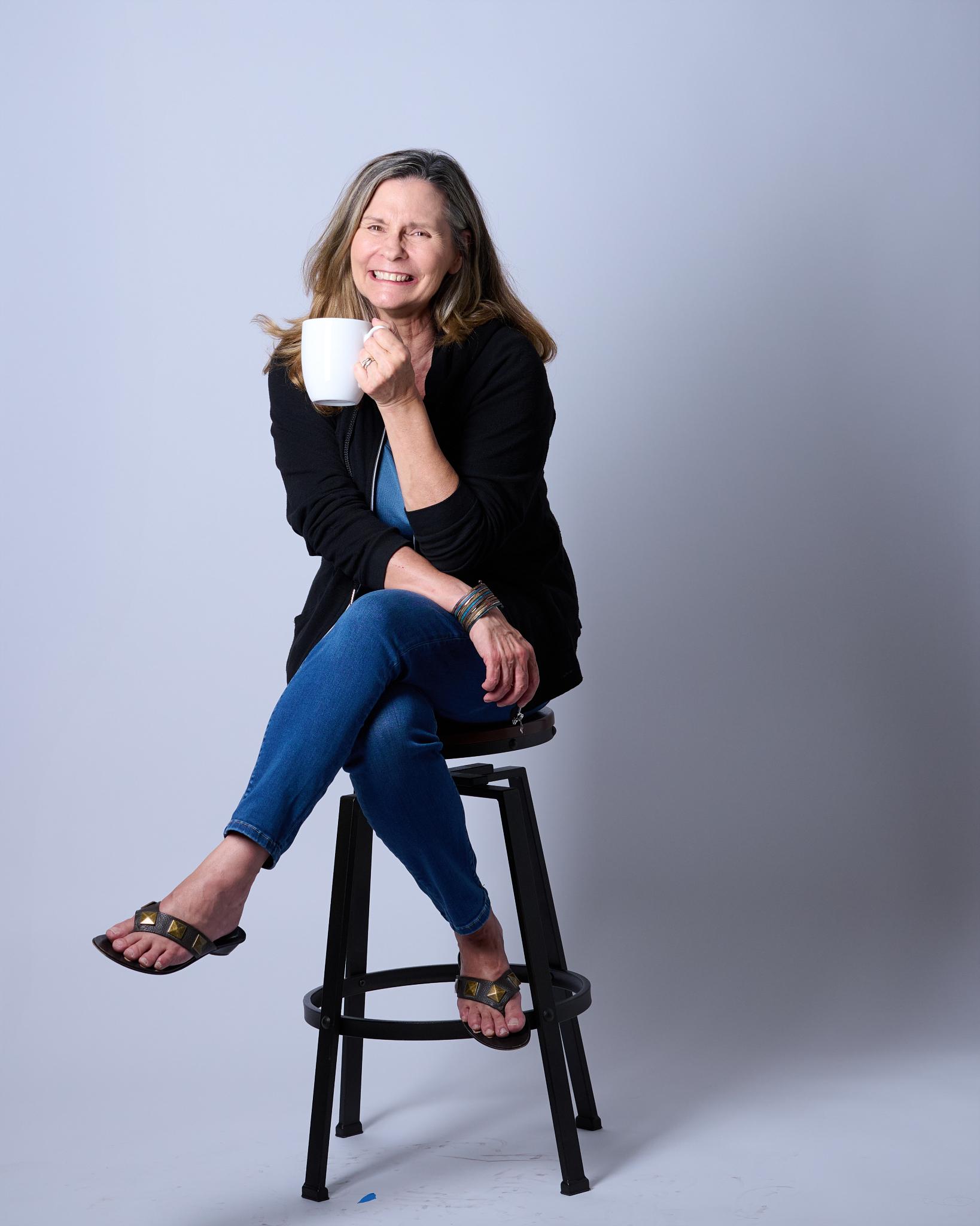 Cindy enjoying coffee - frame 16