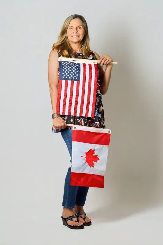 Cindy Quinn personal photo with American flags